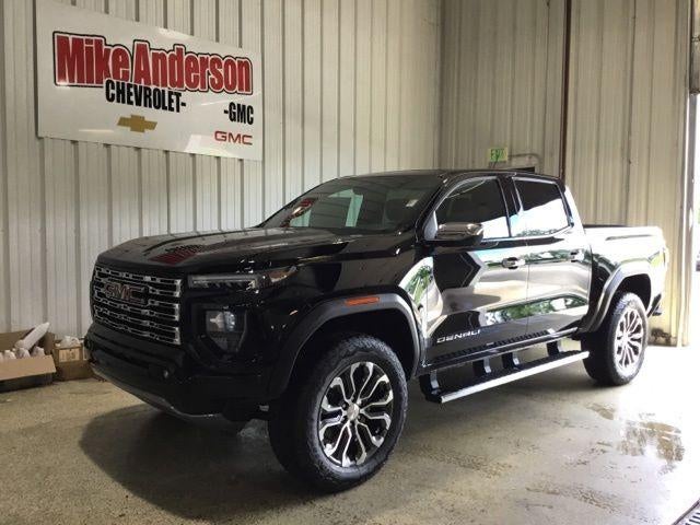 2026 GMC Canyon Denali in Onyx Black — front three-quarter view